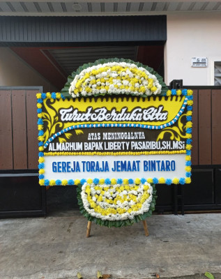 Papan Bunga Duka di Poyowa Besar Dua