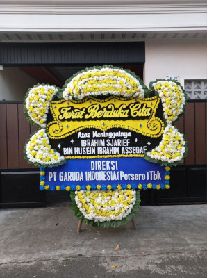 Papan Bunga Duka di Poyowa Besar Dua